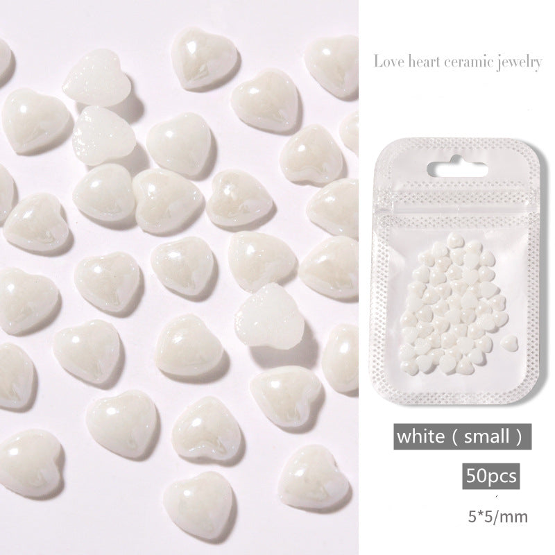 NDE052  50 pieces of nail art accessories white love jewelry peach heart white heart-shaped color ceramic 3D nail decoration